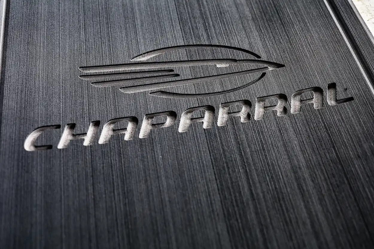 Chaparral Logo upclose in Dark grey on light grey EVA Flooring